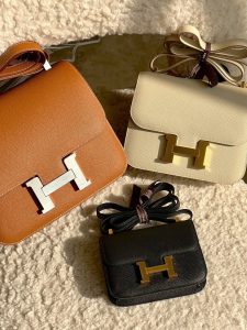 Different sizes of the Hermès Constance bag: 14, 18, and 24