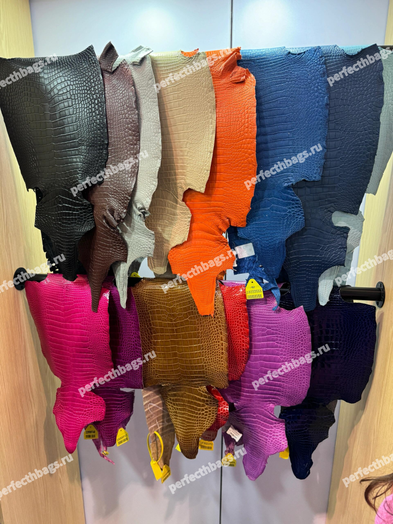 Various exotic leather skins, including materials used for the Birkin Himalayan bag, displayed in multiple colors.