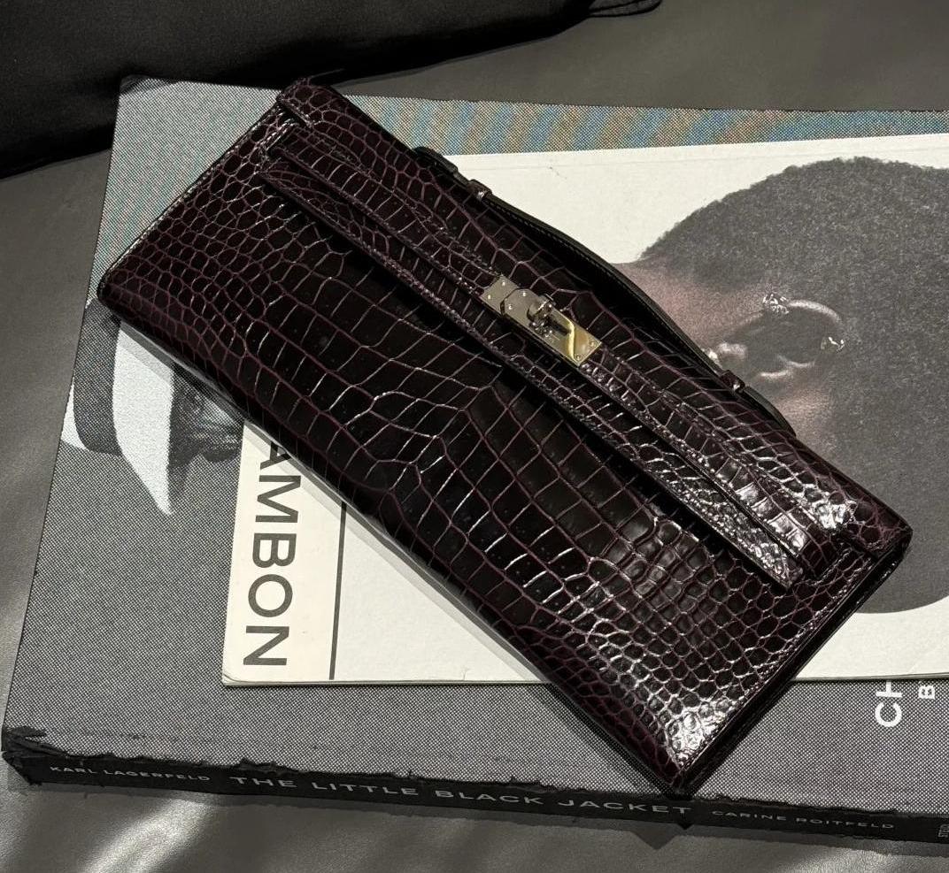 Hermès Kelly Cut clutch in shiny crocodile leather