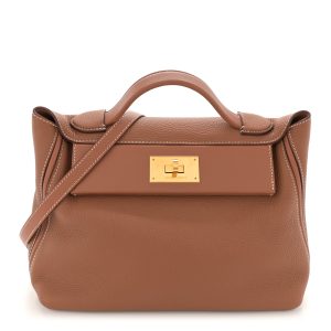 Hermes 24/24 29 bag in classic Gold Togo leather and soft Swift leather.